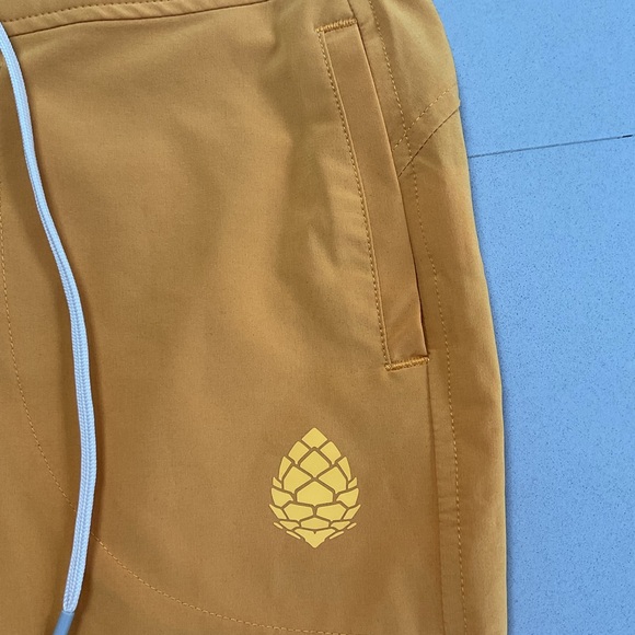 Stio Yellow Track Pants with Elastic Waistband and Tapered Legs - Picture 4 of 6